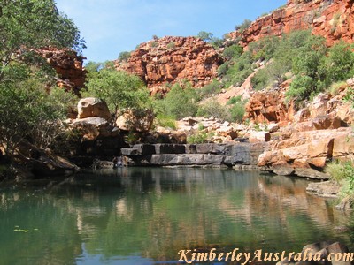 A small pool and waterfall in a side gorge. A small pool and waterfall in a side gorge.