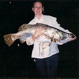 Tara showing off her Barramundi Tara showing off her Barramundi
