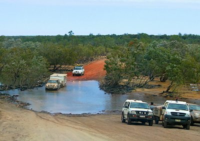 Four Wheel Drives At Creek Crossing On The Gibb River Road