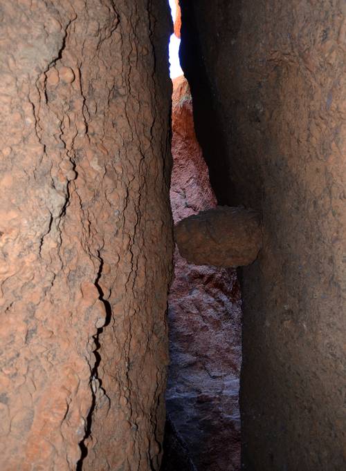Boulder wedged in the chasm