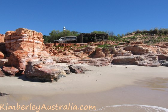 Beach, shelter and lighthouse