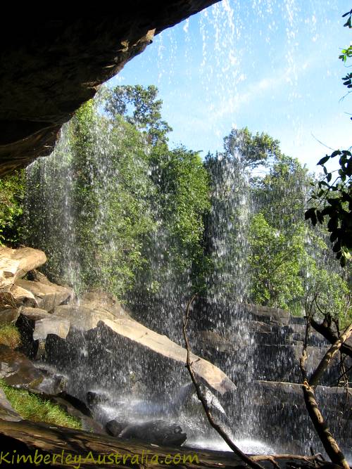 Standing behind the waterfall, looking out