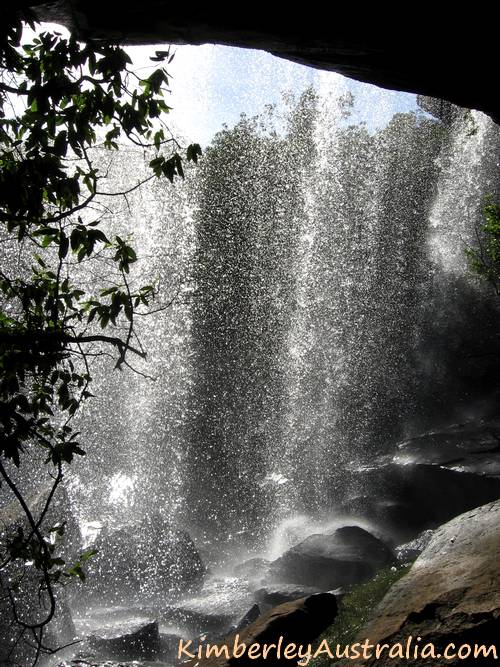 Looking out from the cave under Little Mertens waterfall