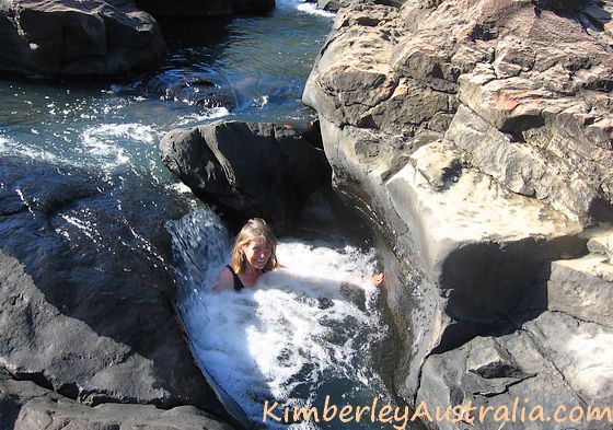 Sitting in the natural spas above Little Mertens Falls