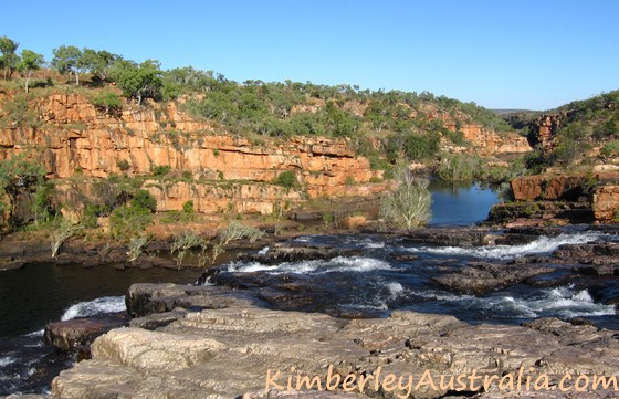 Standing above the waterfall