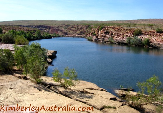 Walking along the first pool of Sir John Gorge