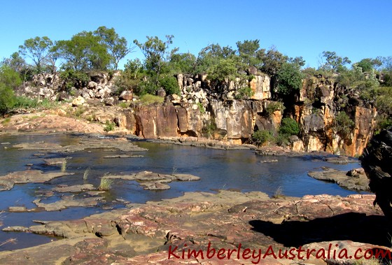 Crossing the top of Big Mertens Falls